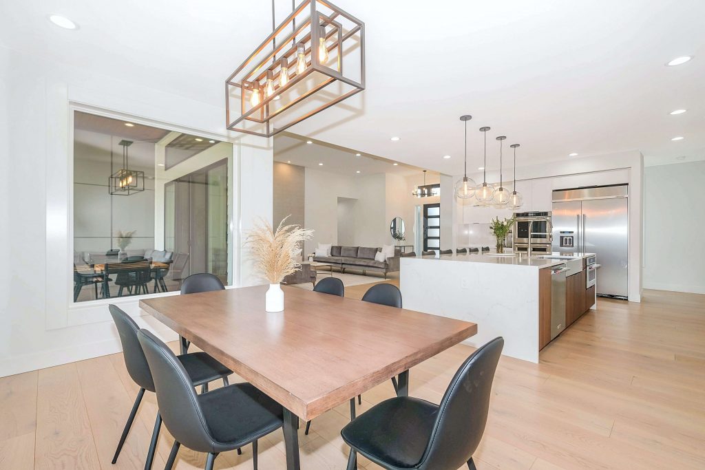 modern dining area overlooking kitchen and living room, melville
