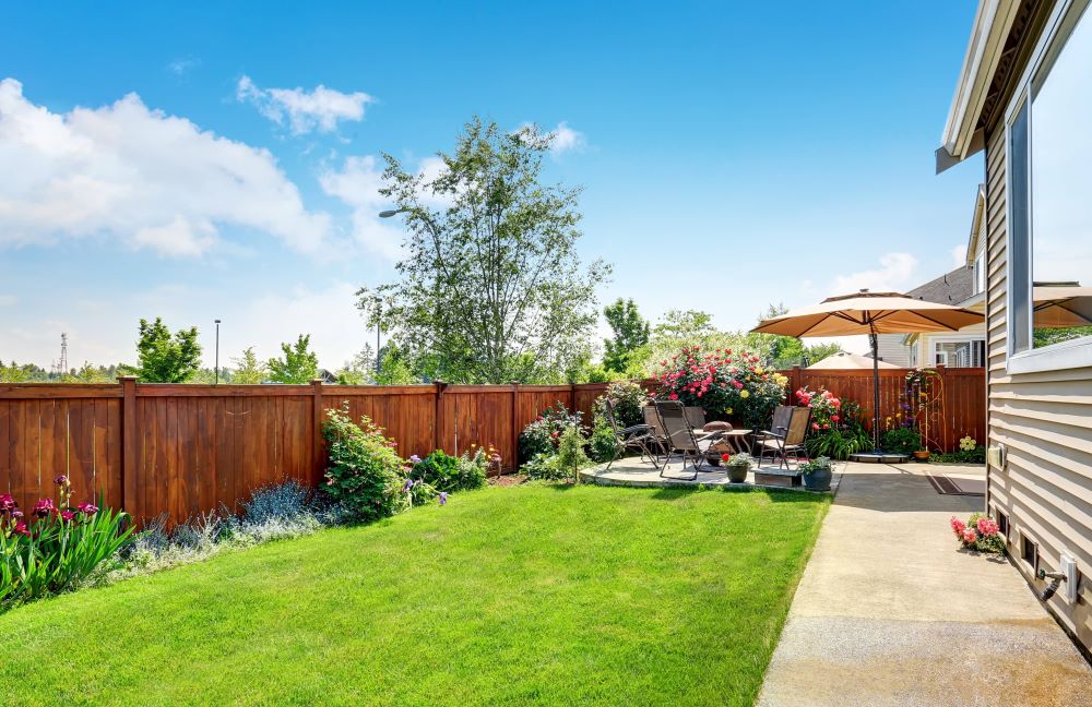 Landscaped garden and patio area.